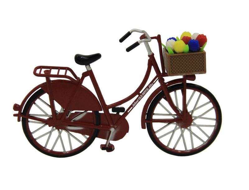 Miniatur-Rotes Fahrrad mit Tulpen